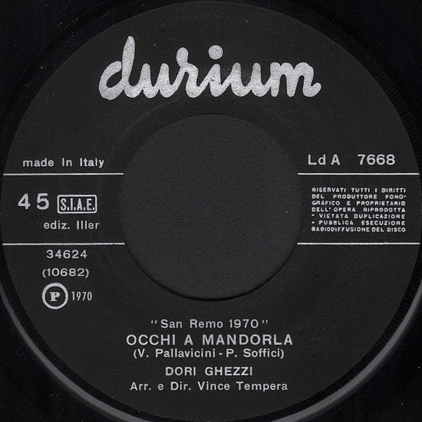 Occhi A Mandorla / 	Un Bacio No Due Baci No
