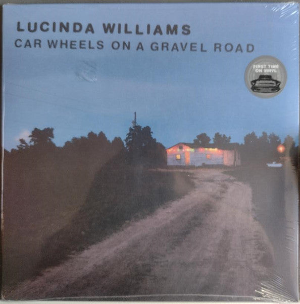 Car Wheels On A Gravel Road