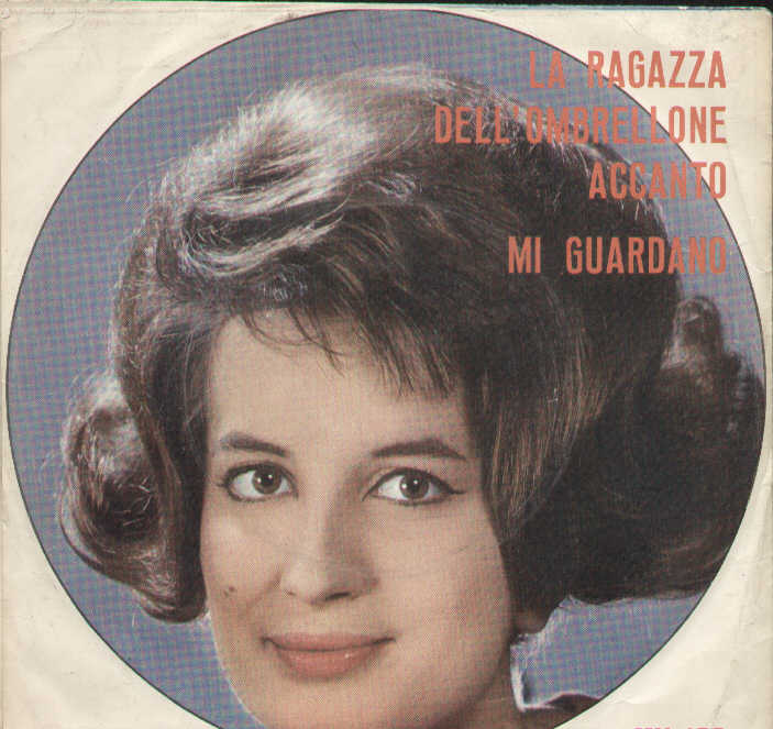 La Ragazza Dell'ombrellone Accanto - Mi Guardano